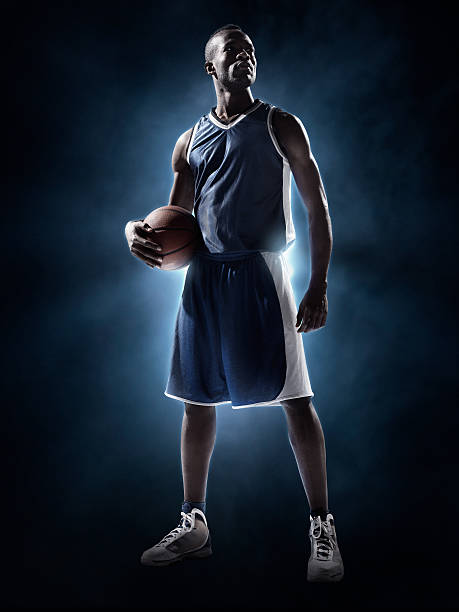 basketball player - sportsman front view studio shot looking at camera stock-fotos und bilder