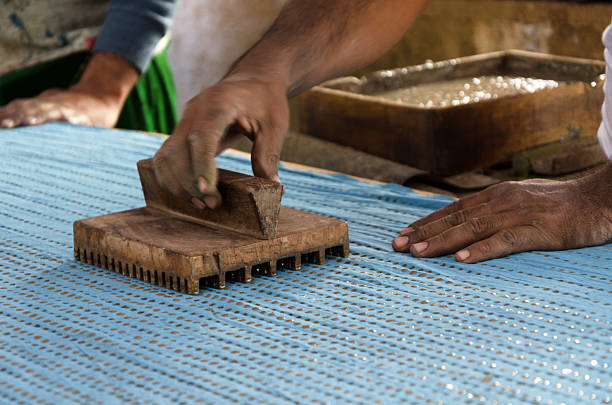 Wooden stamp tool on colorful fabric