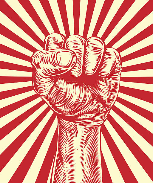 Revolution fist propaganda poster An original illustration of a revolutionary fist held in the air in a vintage wood cut propaganda style propaganda stock illustrations