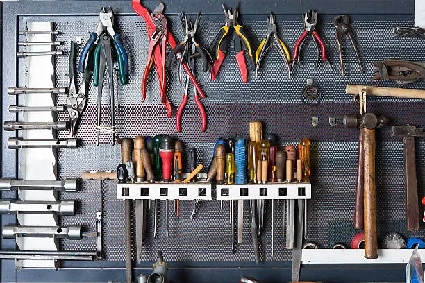 Photo of tools on a metal board