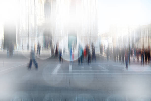 istock Blurry people walking on city center 534870719