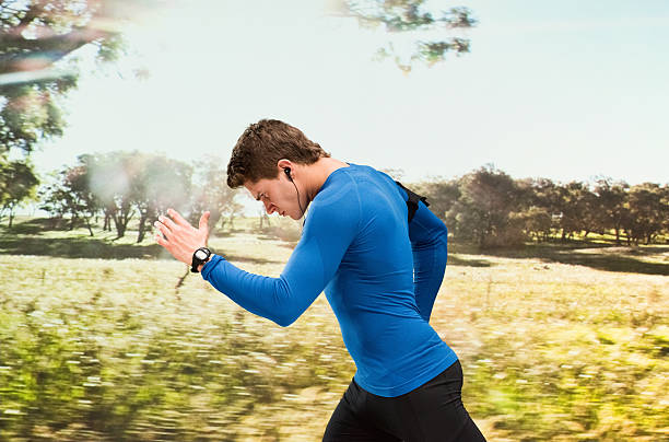istock Male runner running outdoors 534880120