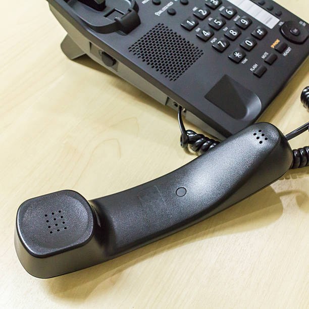 istock Telephone on Wooden Table Background 534887389