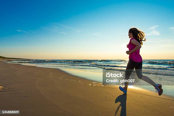 Girl Running On Beach Stock Photo - Download Image Now - 14-15 Years, 16-17 Years, 2015