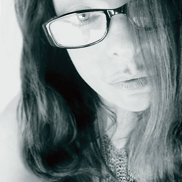 istock Brunette Woman With Glasses Staring 534890079