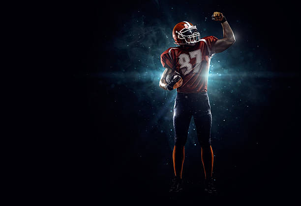 istock American football player in spotlight 534891353