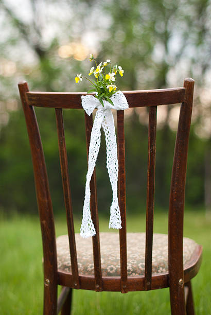 istock Chair and beautiful little flowers 534891443