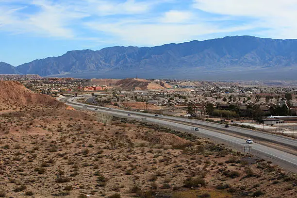 Looking down on an overview of Mesquite Nevada. Highway I-15 seen below.  Known for golf courses,casinos and warm desert weather.  A warm weather retreat for Snowbirds to the North.