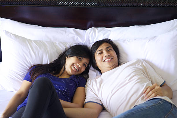 istock Happy Couple In The Bed 534894209
