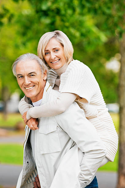 istock Senior Couple Piggy Back Ride 534894293