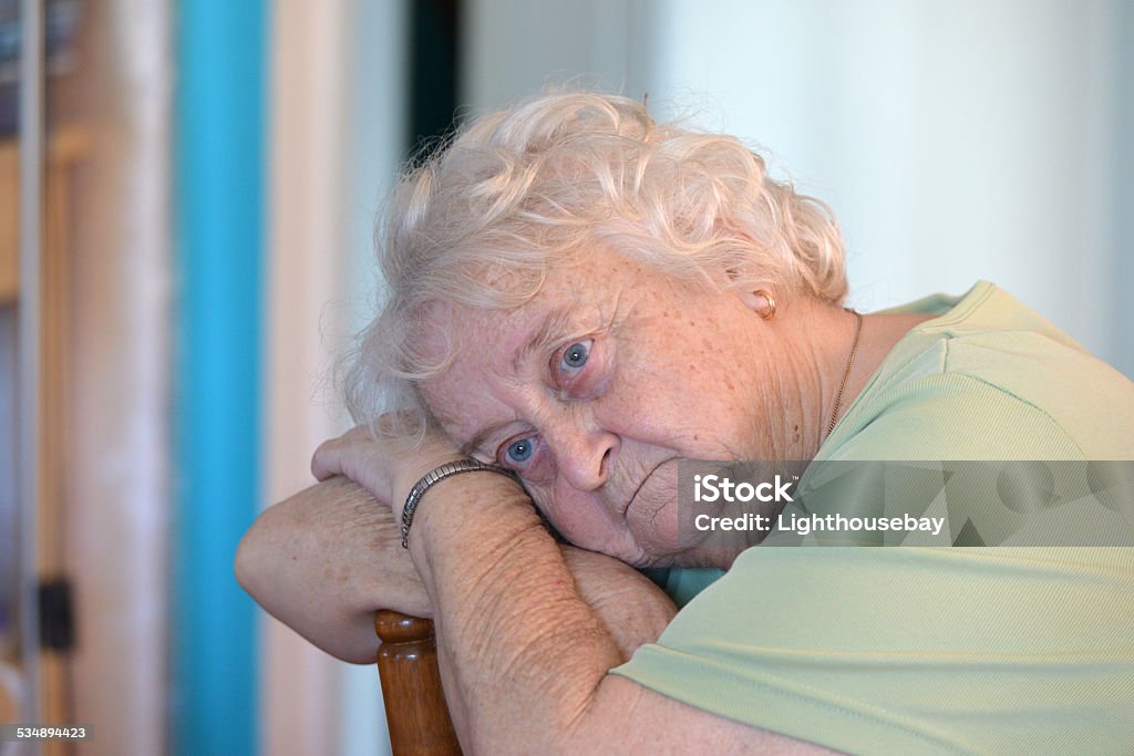 Portrait of a depressed old lady A depressed old lady 70-79 Years Stock Photo