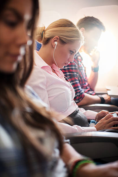istock Listening music in an airplane. 534895605