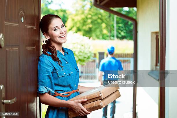 Young Woman Holding Packages Stock Photo - Download Image Now - 2015, Adult, Adults Only