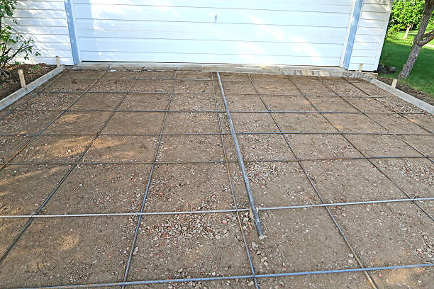 istock Preparing to make a concrete driveway- rebar in place 534901162