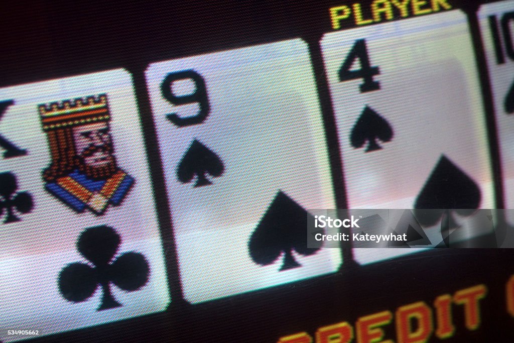 Close up of a video poker machine macro close up of a video poker machine. black background Video Still Stock Photo