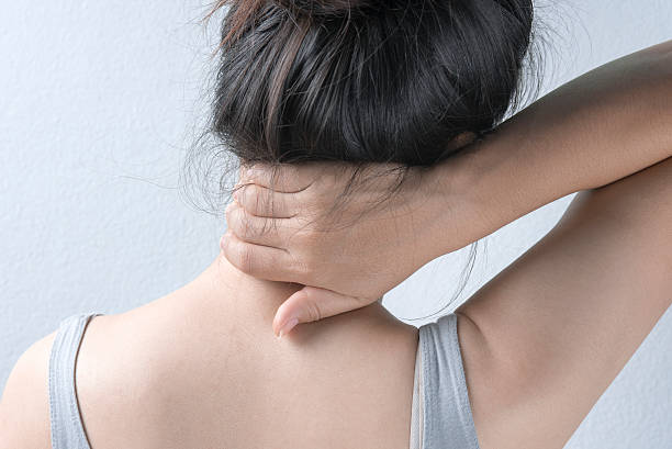 istock Woman Massaging Neck, Rear view 534918005