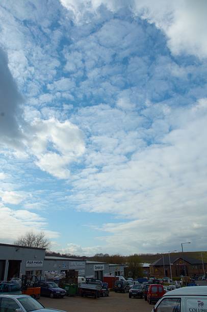 Fluffy Clouds Covering A Blue Sky stock photo