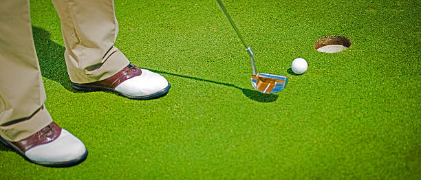 istock Close-up of Golfer Putting 534918325