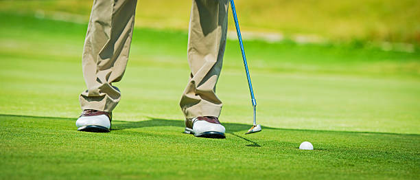 istock Close-up of Golfer Putting 534918423