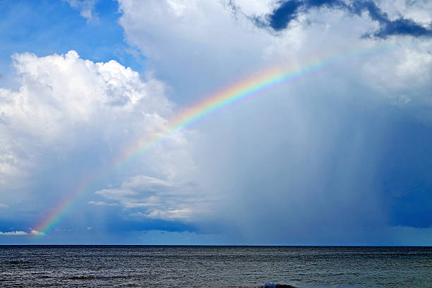 istock rainbow and the cloud      south china sea 534919277