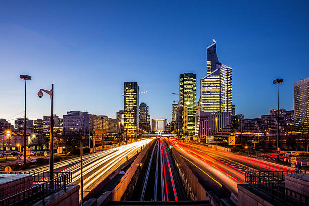 istock La Defense, Paris's financial district illuminated with traffic light trails 534920953