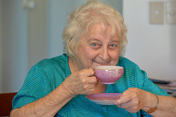 istock One happy old lady having a cup of tea 534923927