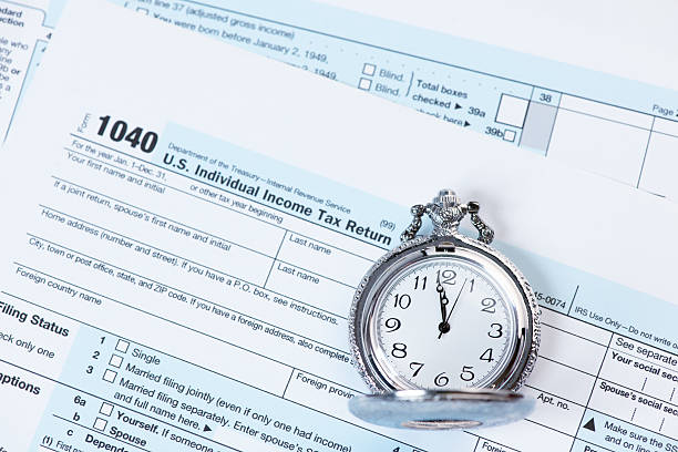 istock US tax form Clock and Glasses 534924181