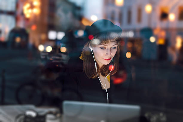 istock Woman in Cafe Working on Laptop 534924599