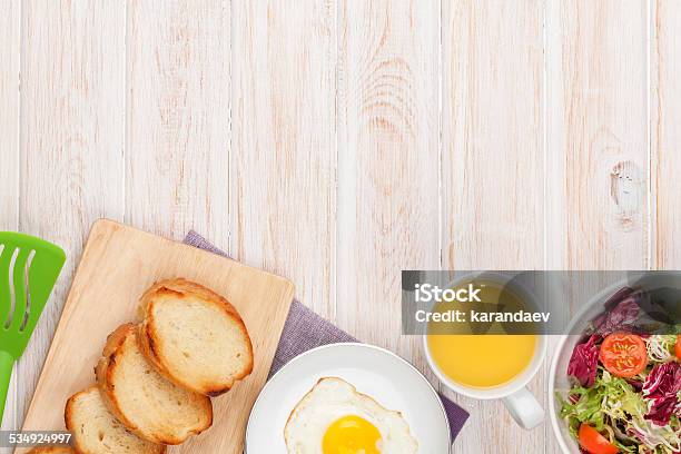 Healthy Breakfast With Fried Egg Toasts And Salad Stock Photo - Download Image Now - 2015, Above, Bread