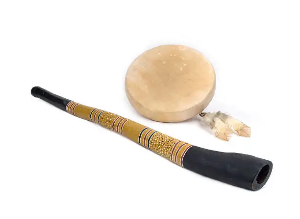 Sound Healing Instruments - Didgeridoo and Native American Drum with Feathers.