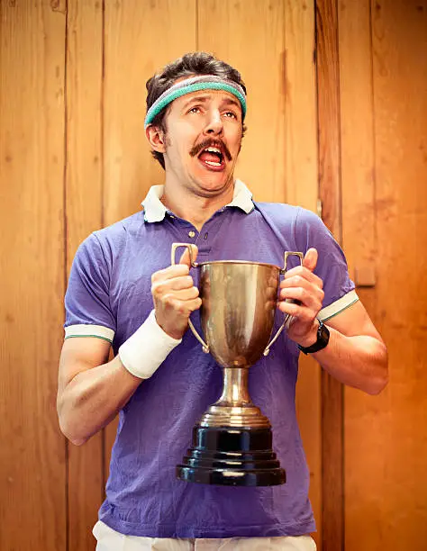 Photo of Man with trophy
