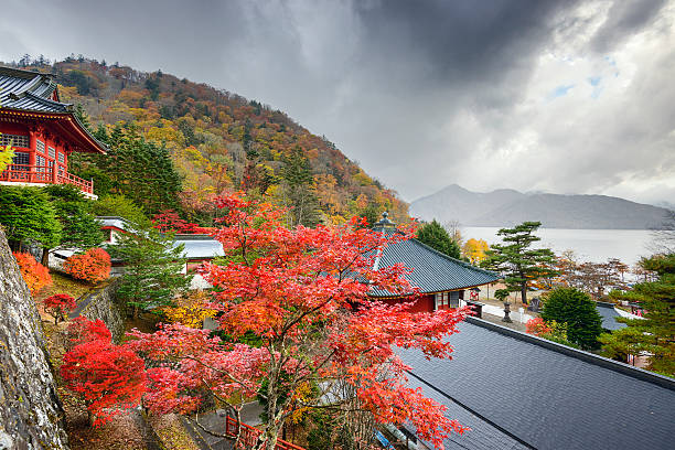 Nikko, Japan - October 31, 2012: The autumn foliage viewed from Chuzen-ji Temple towards Lake Chuzen-ji. The temple was founded in 784 AD.