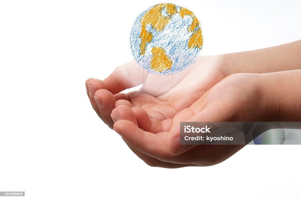 輝く地球に浮かぶ、子供の手 - 地球儀のロイヤリティフリーストックフォト