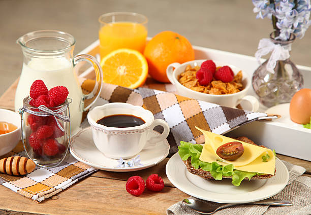breakfast on wooden table stock photo