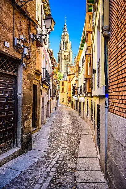 Toledo, Spain alleyway towards Toledo Cathedral.