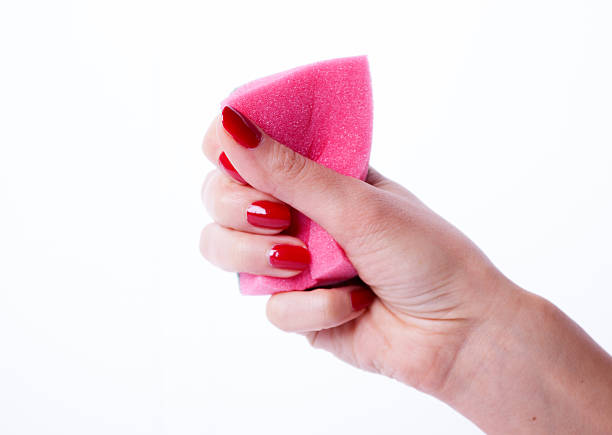 istock Woman hand holding cleaning sponge 534939227