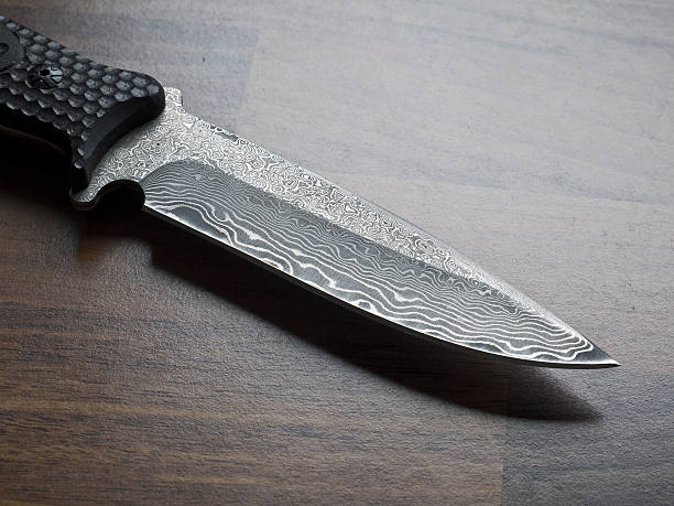 istock Damascus steel dagger close-up. 534939585