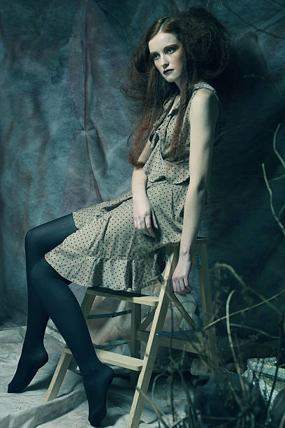 istock fashion model sitting on a stool 534940219