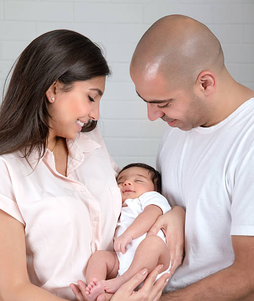 istock Happy parents with little child 534942233
