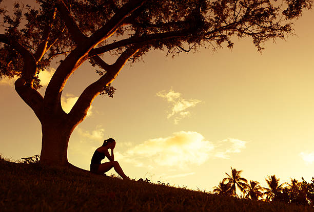 istock Sad woman in the park 534943233