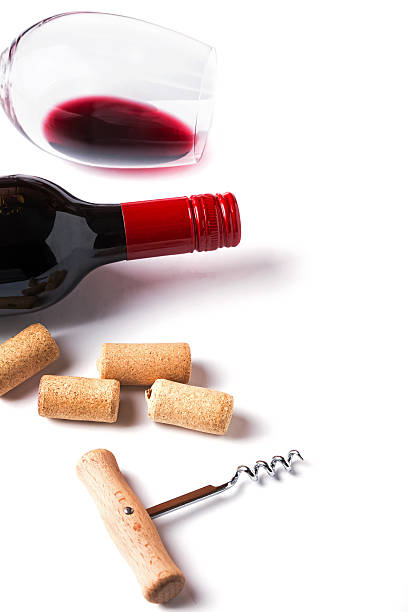istock Bottle, glass with red wine, corks and corkscrew 534971777