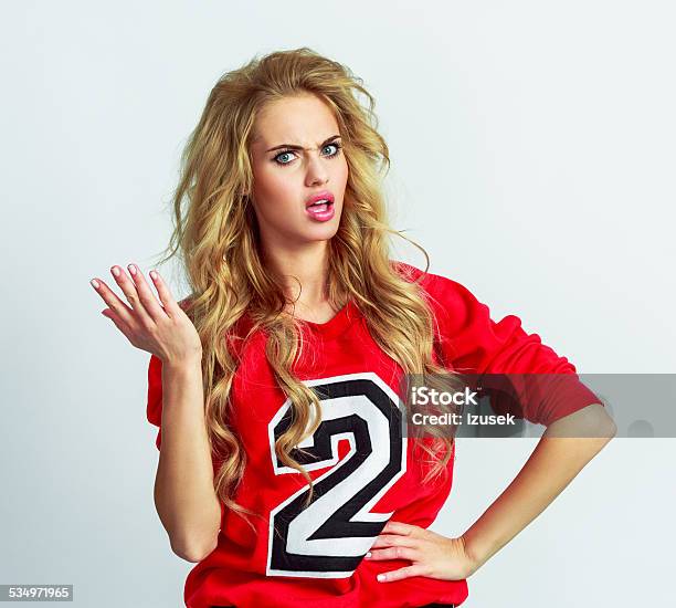 Displeased Young Woman Stock Photo - Download Image Now - Cheerleader, Distraught, 2015