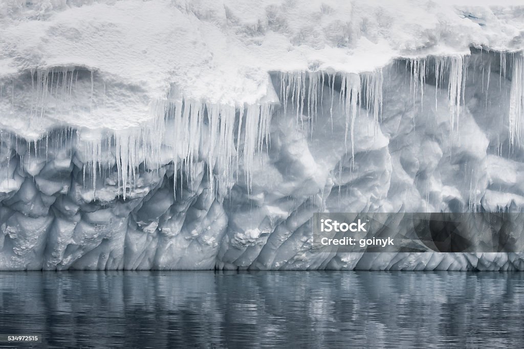 Antarctic iceberg Reflection of the Antarctic Glacier with icicles 2015 Stock Photo