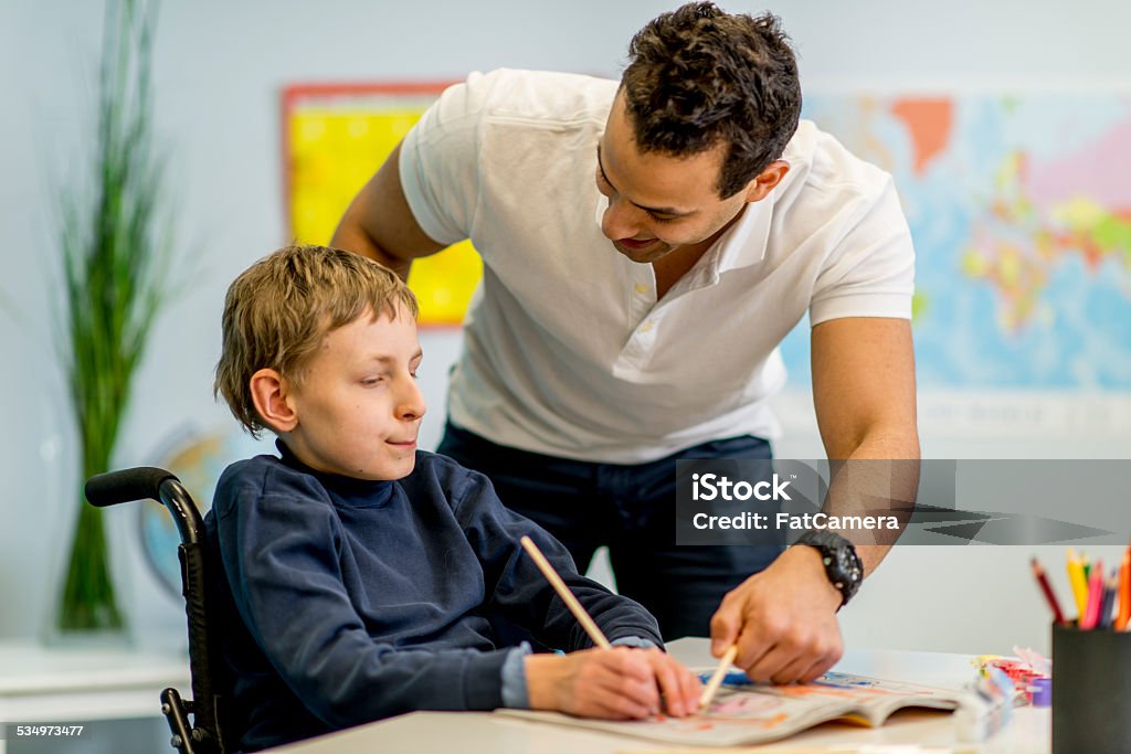 Developmental Disability Boy Boy With Developmental Disability Stock Photo - Download Image Now ...