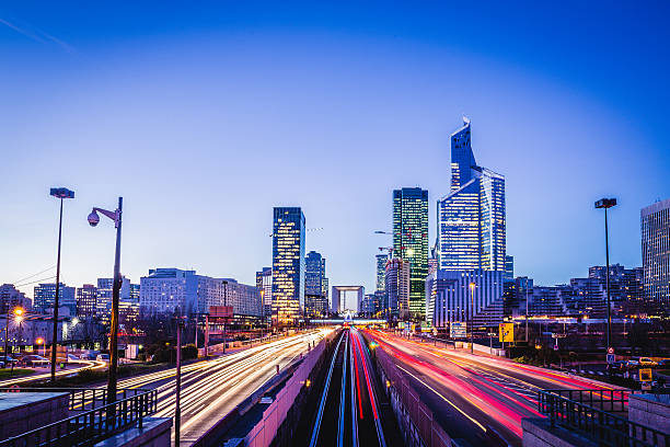 istock La Defense, Paris's financial district illuminated with blurred traffic lights 534978041