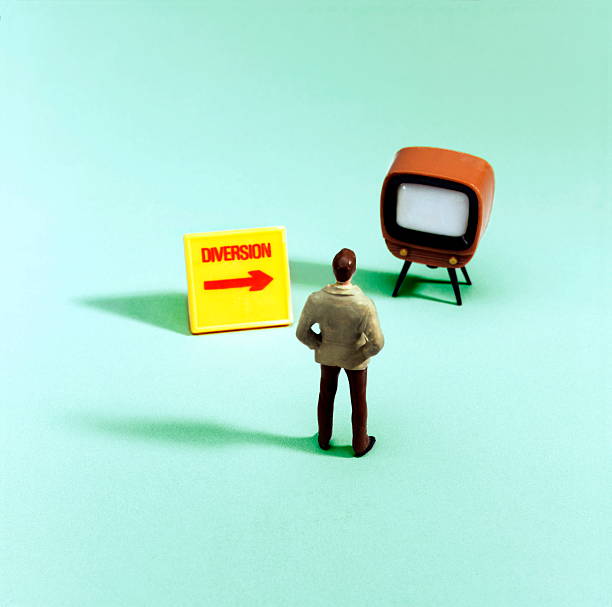 istock Man Looking at Television Diversion 534979631