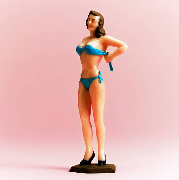 istock Woman Putting on Blue Bikini 534979677