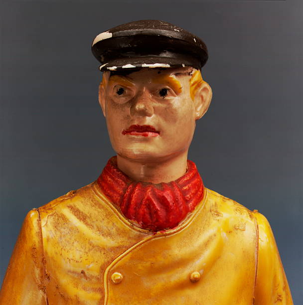 Man in Black Hat and Mustard Jacket