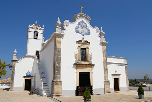 Exterior of the Saint Lawrence of Rome church in Almancil, Portugal. Church has one of the most beautiful in Portugal hand painted tiles (Azulejo) of the 18th century at the facade.