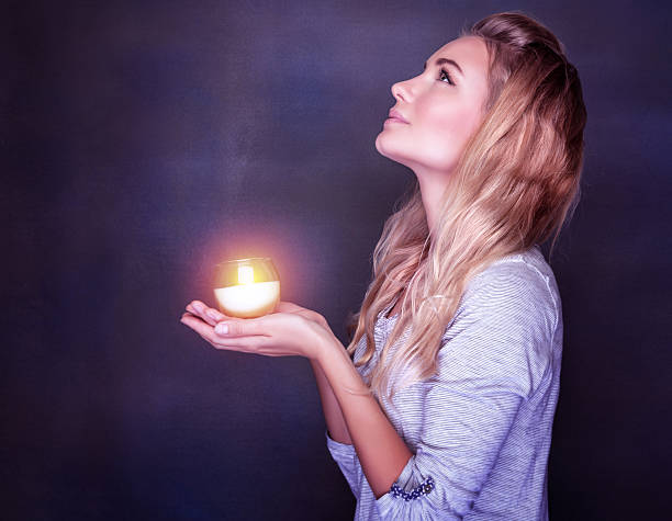 istock Beautiful girl praying 535005767